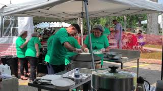 Cooking cheese manoushi at the St. Maron Food Festival - Ohio