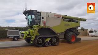 Farm machinery Headers travelling outback Australia