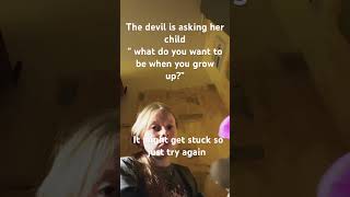 The devil is ￼asking ￼her child what do you want to be when you grow up?