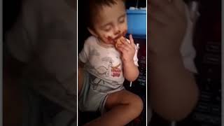 #Cute little baby Eating chocolate while sleeping#Mumbaispice #2021