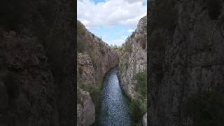 Wooden Bridge Over River In Spain