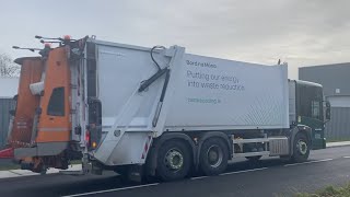 Board Na Móna 2024 Mercedes Benz Econic with a Faun Variopress with Zoeller Dela 2322 passing by