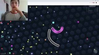 Playing Slither.io and lagging to ruin gameplay.