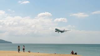 4K View of Mai Khao Beach and Airliner Landing at Phuket Airport - Free Stock Footage Download!