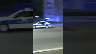 Romanian Police siren shattering into the night..