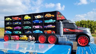 Favorite "Cars minicar" & large truck | Put the minicar you found on the truck.