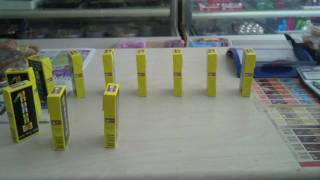 SportBilly playng Domino with cigarete filters box....