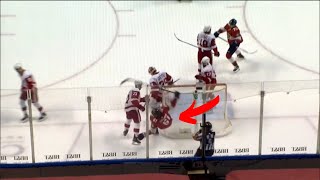 Dylan Larkin Crushes Riley Stillman after the Whistle