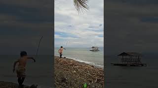 Kid on the seashore #kid #child #shore #seashore #cottage #seacottage #floatingcottage