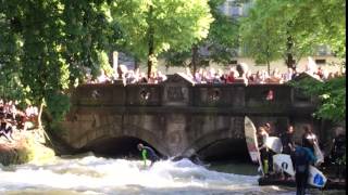 Surfing on the Isar River, Munich Germany