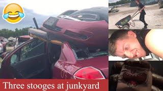 Three stooges at a junkyard