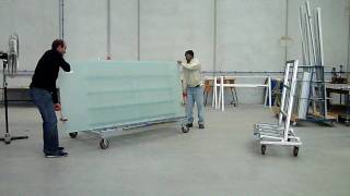 The Glass racking Company Carrymate unloading Glass trolley shown with safety arms