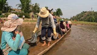 VIETNAM — Crossing the river by dugout canoe in the Bahnar community