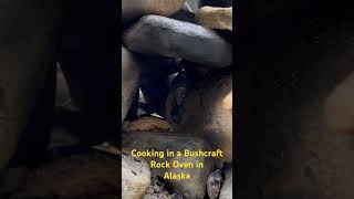 Cooking in a Bushcraft Rock Oven in Alaska. #alaska #bushcraft #cooking