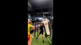 Random man keeps interrupting woman’s heavy bag workout