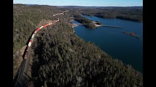 CPKC trains 101 & 421 at Heron Bay, Ontario, Canada ~ November 19, 2023