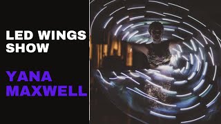 Yana Maxwell performs with LED ISIS WINGS