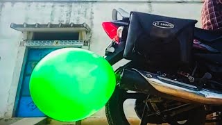 Bike se fulaya balloon ko.  bike ke silencer se fulaya gaya balloon