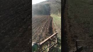 John Deere 3020 plowing