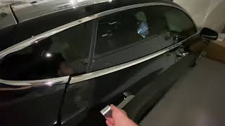 Tesla model s rear door opens handle problem