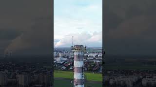 Tower in the sky #tower #sky #clouds #chimney #fly