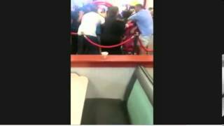 Women carrying children brawl in Chuck E Cheese