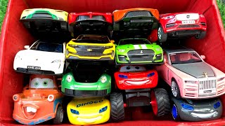 Box Full of Model Cars /Ford GT, Ferrari LaFerrari, Porsche Taycan, Porsche 911, Lightning McQuuen