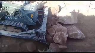 Cat D8K pushing ROCKS