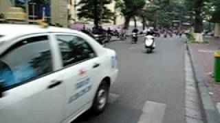 Crossing a busy Hanoi street