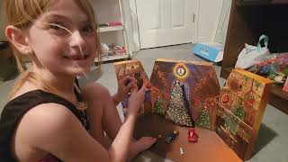 Scarlett opens all 24 days of the Harry Potter Magical Minis Christmas Advent Calendar