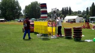 John Evans balances 225 pints of beer on his head