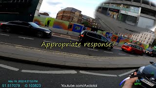 Private hire driver beeping when there's no space to pass. This is in the pedestrian crossing zigzag