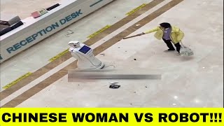 Woman fights robot in China