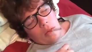 Dude eats cigarett while sleeping