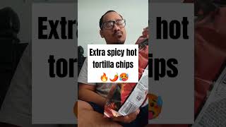 eating Doritos xxtra flamin hot nachos. . .