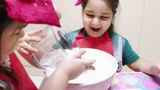 Waliha trying to make muffins in presence of Saliha