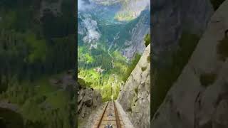 The Gelmerbahn is a railway that offers views of mountains and lush fields in Switzerland. #shorts