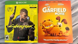 Cyberpunk 2077 Xbox One and Garfield 2024 DVD + Blu-ray + Digital unboxing.