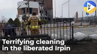 Bodies of people killed by the Russian invaders are being taken away from the liberated Irpin