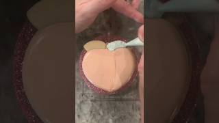 Decorating Georgia peach cookie with royal icing. #decoratedcookies #cookies #cookiedecorating