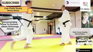 Demonstrating How To Perform Aikido Shihonage Omote