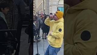 DRUNK MAN TAKES STREET PERFORMERS MIC AND STARTS SINGING