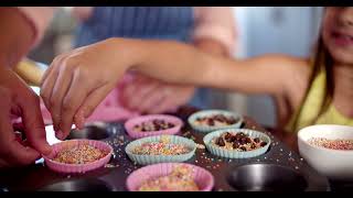 Mom and Daughter Decorating Cupcakes Together - Free 4K StockFootage Download