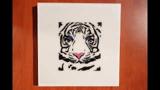 An image of a white tiger made of resin and sand / template / stencil / resin art