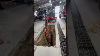 Digging Out Contaminated Soil in a Dealership