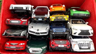 A Box Full of Audi R8, McLaren Senna, Mercedes Slr, BMW Dtm, Porsche 911, Lamborghini Veneno, Jeep