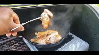 Backyard Cooking .Green onion  out the garden and Garlic Cornish Hen.