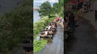 Resilient Pub-Goers Drink on Flooded River Thames Benches || Dogtooth Media