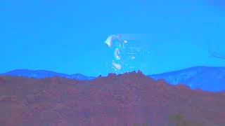 Playing funky music in the desert... floating over red rocks...