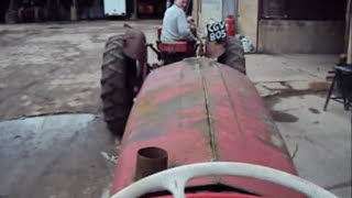 Nuffield 465 tractor towed around the yard...